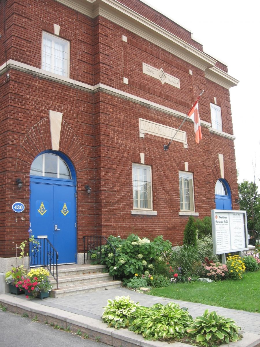 Exterior view of a red-brick, two-storey hall built in 1924.